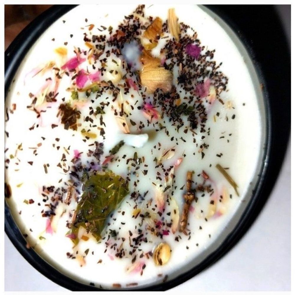 Hand crafted natural herbal orange tea candle